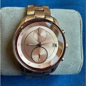 Michael Kors women’s watch, rose gold tone. Model MK6465.